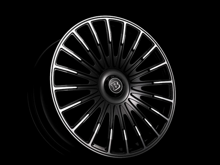 Car wheel rim with a brand logo on a black background