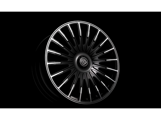 Car wheel rim with a brand logo on a black background