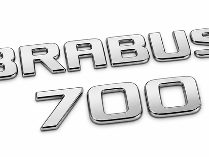 Chrome BRABUS 700 emblem on a white background