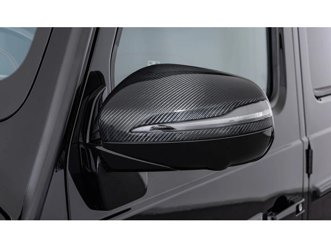 Carbon fiber-textured car side mirror on a vehicle