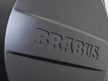 Close-up of a Brabus logo on a textured surface