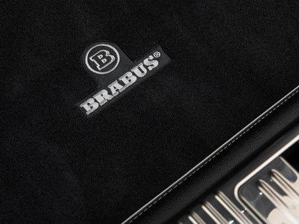 Brabus logo on a black surface with metallic elements