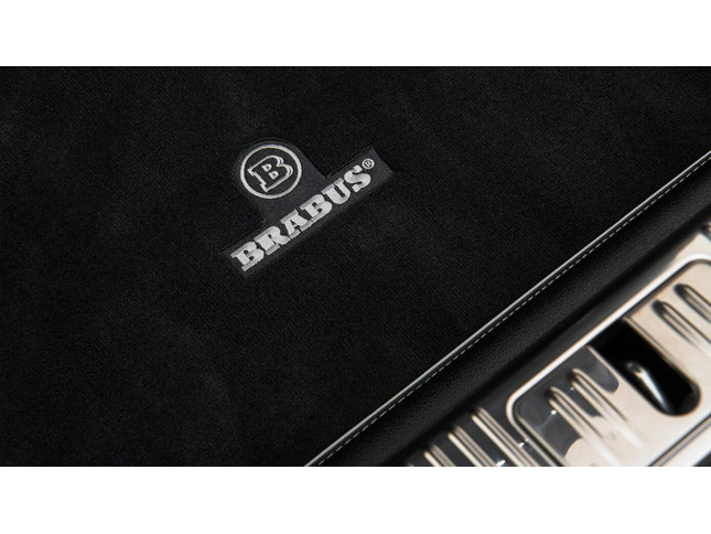 Brabus logo on a black surface with metallic elements